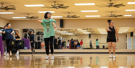 Students in studio during a Zumba class