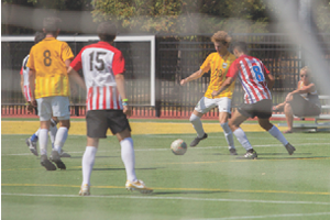 Men playing soccer