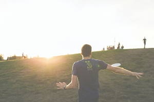 Man playing Ultimate frisbee