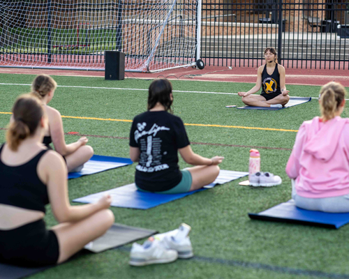 Students in yoga class.